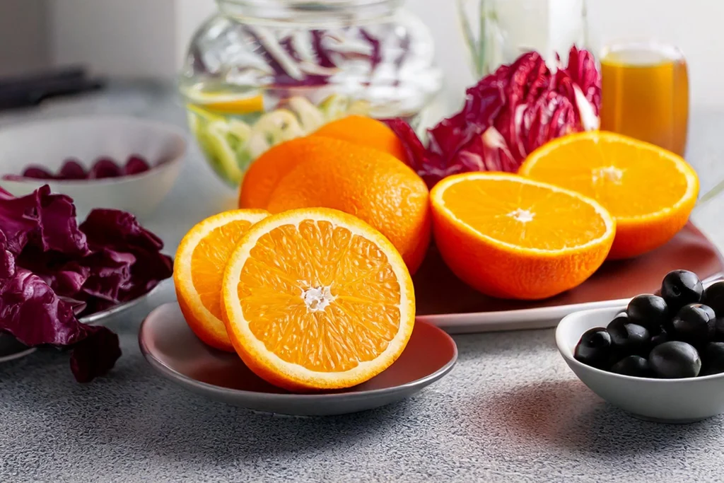 Ingredienti per insalata di arance, finocchio, radicchio e olive nere – ricetta crudista vegana